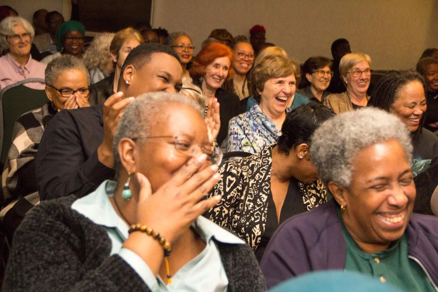 The laughter in the room